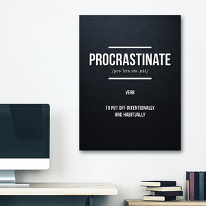 Funny wall art with the definition of "procrastinate", poster is hung on dorm wall