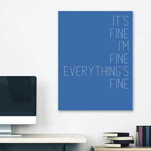 Blue minimalist canvas wrap wall art hanging on white bedroom wall with funny saying "It's fine"