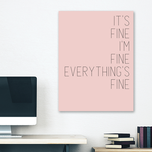Pink minimalist canvas wrap wall art hanging on white bedroom wall with funny saying "It's fine"