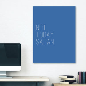 Blue minimalist canvas wrap wall art hanging on white bedroom wall with funny saying "not today satan"
