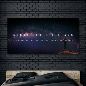 Demotivational poster with funny saying; "shoot for the stars" wall art hung in bedroom